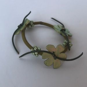 Jane Tran green pony tail holder